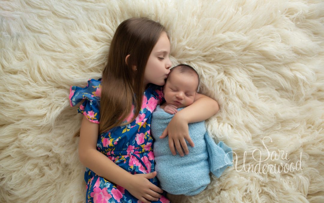 Orlando posed newborn photography with sibling